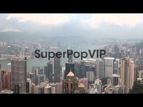 Tourists take in the view from the observation deck at th...