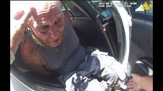 Man Having Panic Attack, Stuffed In Back Of Police Car.