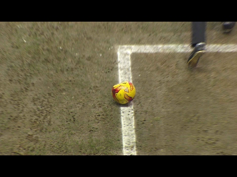 POP! Danny Williams' blocked shot causes the ball to burst