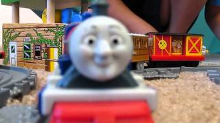 Hank the Large American Tender Engine sits idle with Thomas the Train