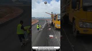 Road Centerline Marking on Fresh Asphalt Highway