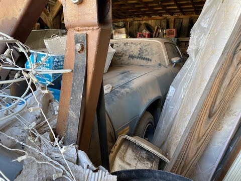 Barn Find BURIED - 1979 Chevy Camaro!  Parked in storage 15 years ago and the piling began!!!!!!!!