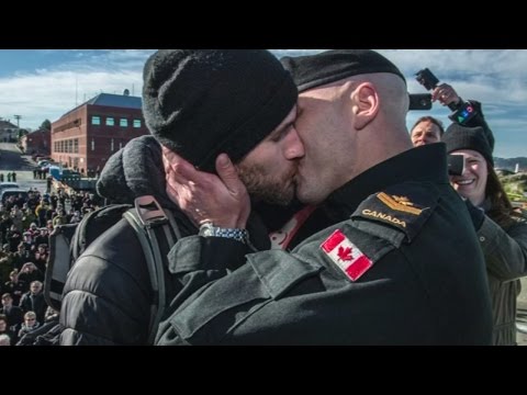 Same-sex couple share traditional Canadian Naval 'first kiss' for the first time