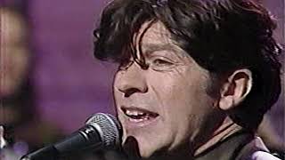 Robbie Robertson performs on late night TV in January 1991