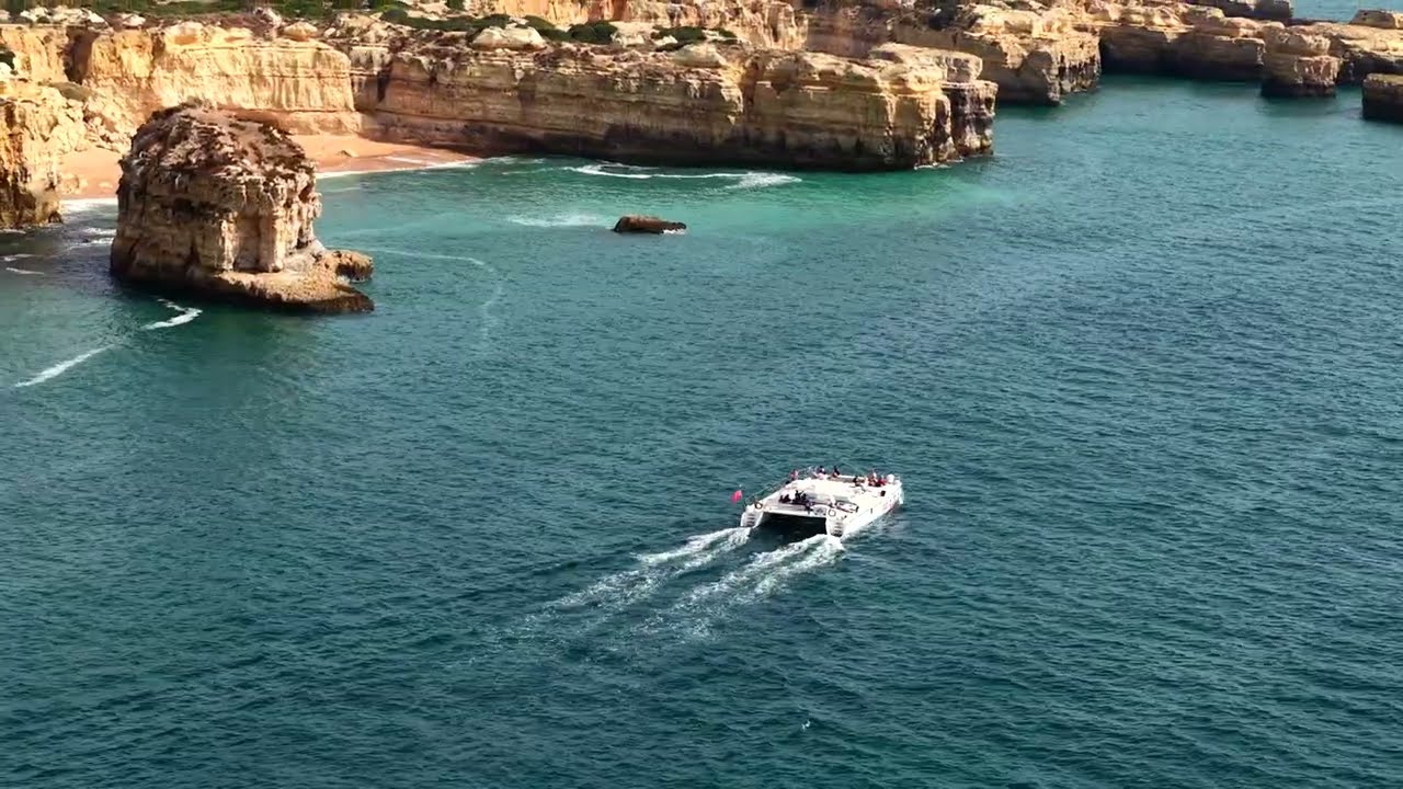 Discover aerial panoramas of Praia do Castelo beach.