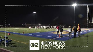 West Islip High School football team honors player killed in house fire