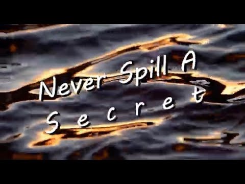 NEVER SPILL A SECRET (Official Lyric Video) - Kendra Dantes