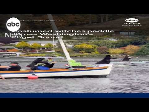 Costumed witches paddle across Washington's Puget Sound