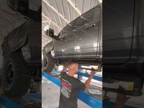 Lifted Ram 2500 Electric Running Boards: AMP Power Steps