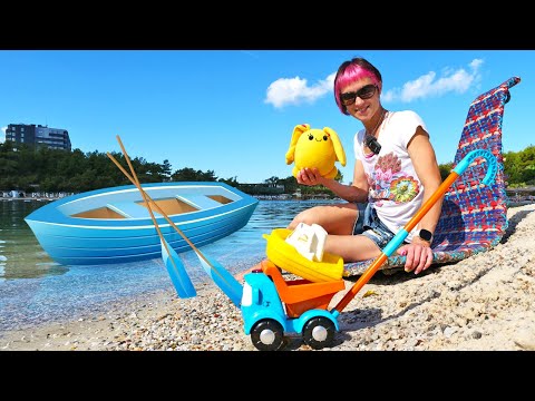 Eine Mami für Lucky. Wir packen Leo der Lastwagen Spielzeug aus. Video für Kinder