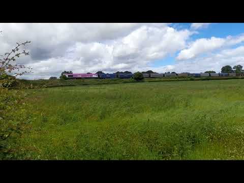 66734 passing Grafton (Hereford) working dee marsh to Margam 8th june 2022