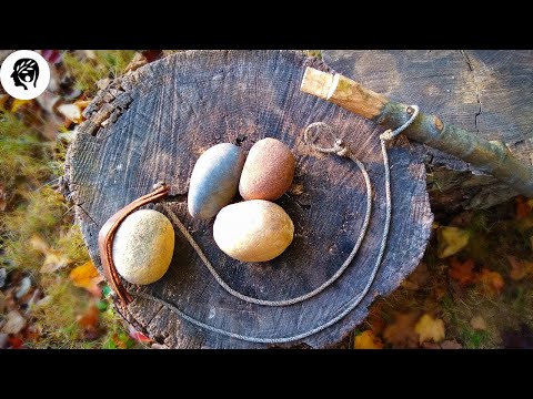 Staff Sling: Savage weapon with fist sized stones!