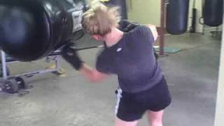 Female Boxing Training Secrets-Upper Cut Bag-Workout-Tips..