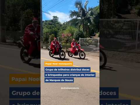 Grupo de trilheiros distribui doces e brinquedos para crianças em Marques de Souza