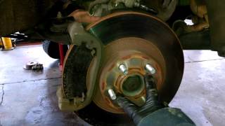 Front brake pad replacement 2003-2014 Subaru Outback Legacy caliper Install, remove or replace rotor