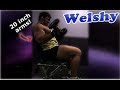 Powerlifter with 20 inch arms training and posing