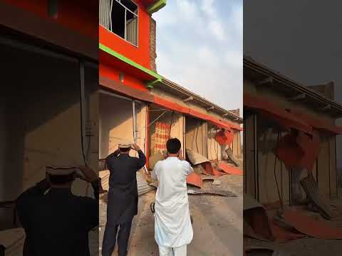 Car Bombing and Fierce Gun Battle Kill at Least 12 Police Officers in Northwestern Pakistan