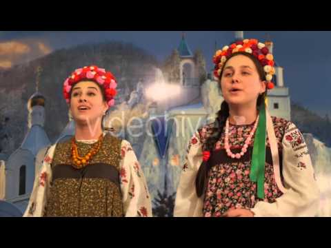 Women at Holy Mountains Lavra Folk Clothes Women Girls Are Singing Christmas Songs and Smiling
