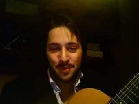 goos playing guitar....