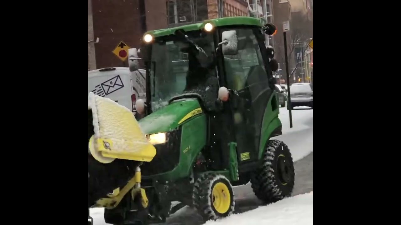 John Deere 1025R Compact Tractor Snow Clean Up With Rotary Broom | Find out more at United AG & Turf
