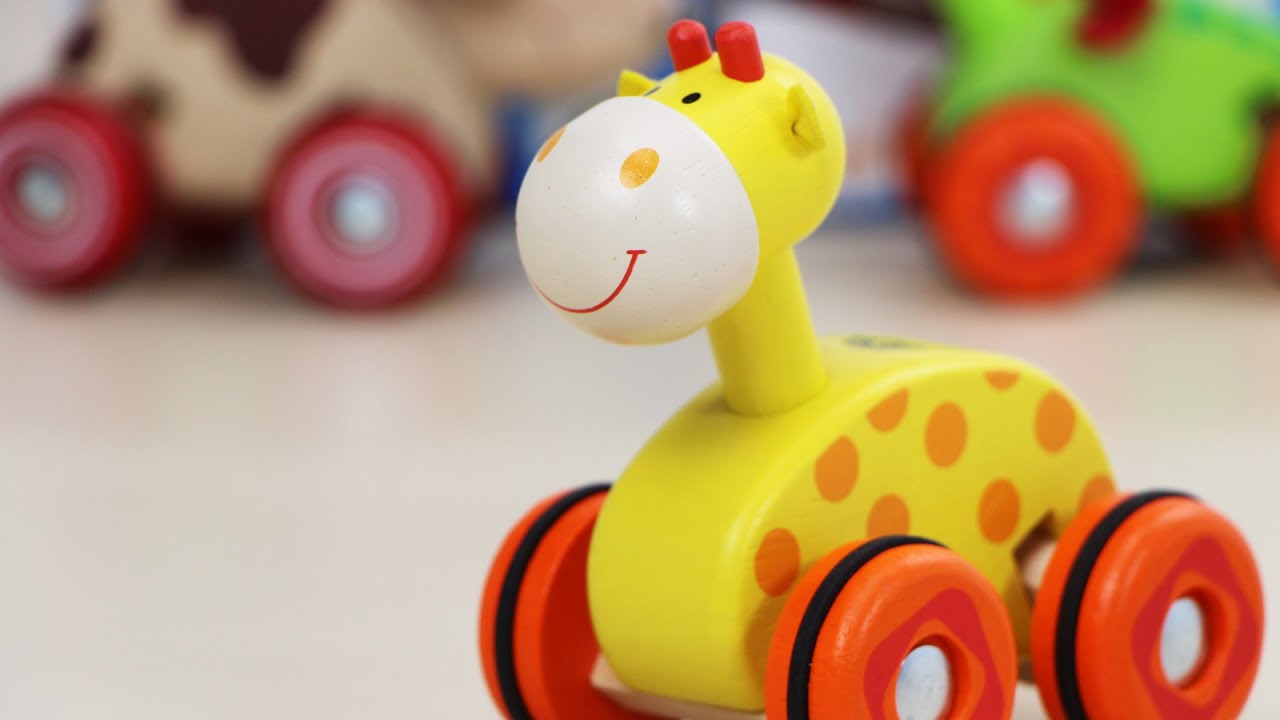 Wonderworld Dřevěná žirafa na kolečkách