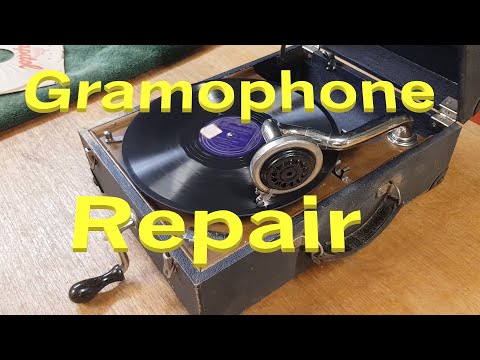 Repairing the brake mechanism on a 1920s portable wind-up gramophone. A quick fix and inspection