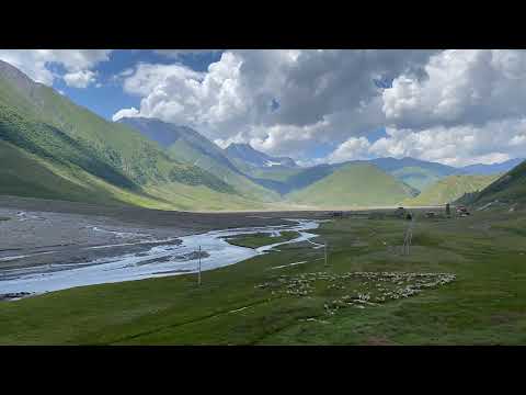 Zakagori Fortress and a Flock of Sheep in Truso Valley