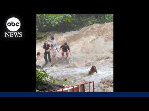 Thailand tourists swept away by raging flood waters