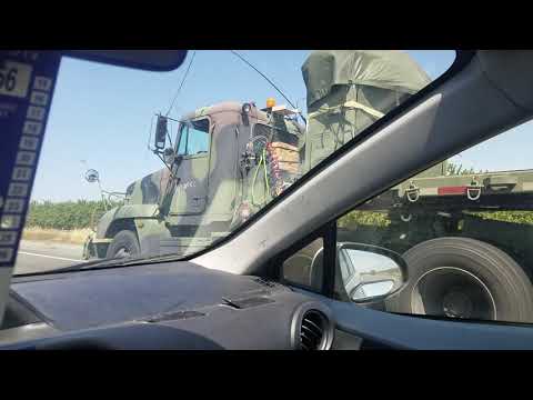 military convoy seen going up I 5 in California