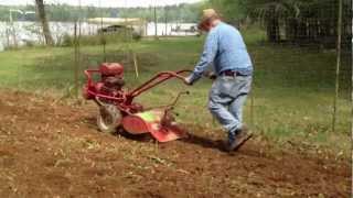 preview picture of video 'Troy Bilt Horse Tiller at work on the lake - Harold Moss'