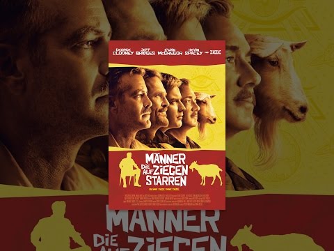 Maenner die auf Ziegen starren