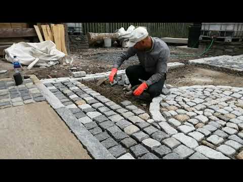 Laying Granite Setts at our yard