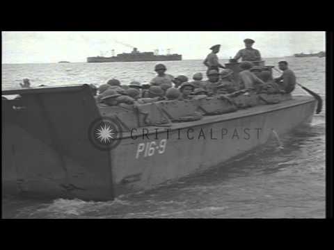 US Marines leave Guadalcanal beach in landing crafts during World War II. HD Stock Footage