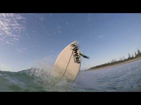 Max and Sam surfing Evans Head