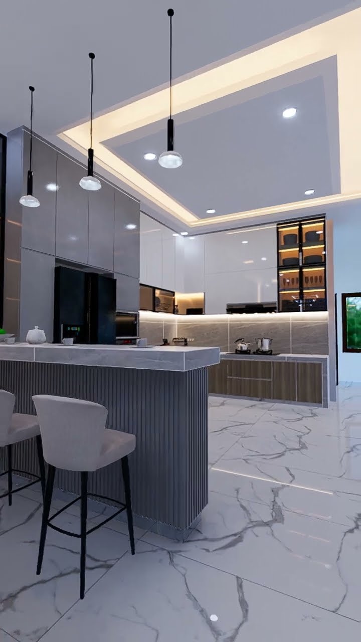 Dapur minimalis dengan minibar dan ruang makan yang modern membuat setiap momen memasak terasa istimewa. Siap-siap jatuh...