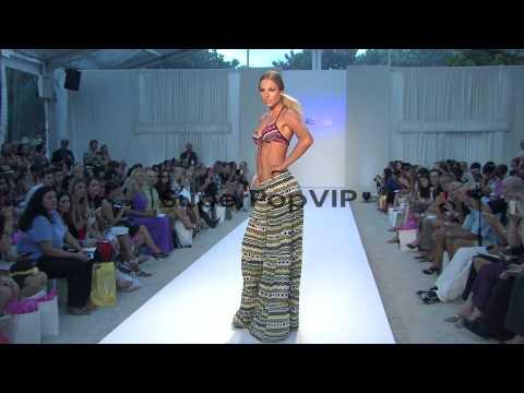 Models walk the runway during the Poko Pano swimwear 2013...