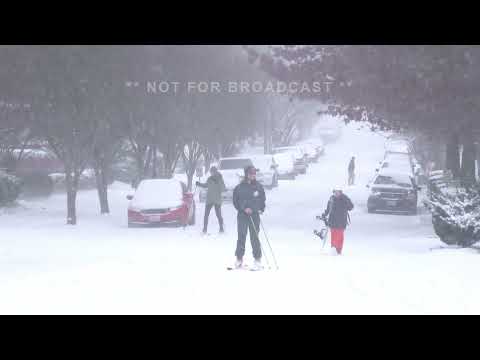 12-26-21 Seattle, WA - Significant Winter Storm - Car Sliding Off Road - City Scenes
