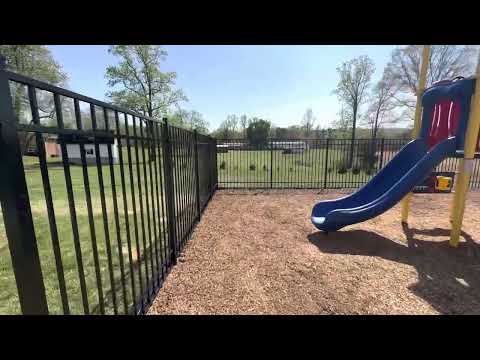 6’ tall  No-Dig aluminum fence.