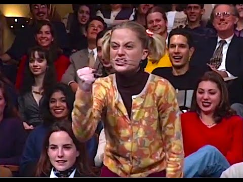 Stacy (Amy Poehler) attacks Andy on Conan
