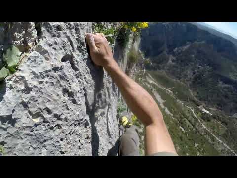 Climbing in Manikia, "Bouc et Mystere" 6c, 200m.