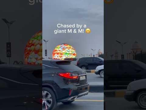 "Rolling Chaos: When a Giant M&M Takes Over" #m&m