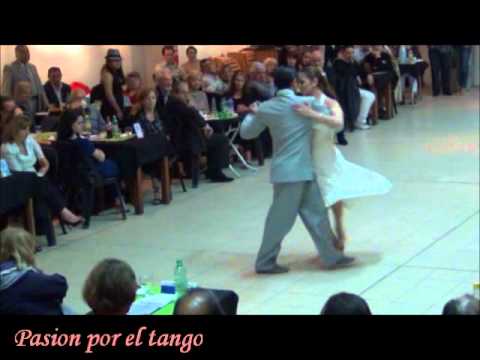  Alejandra Armenti  and  Daniel Juarez  are  dancing  to  the  vals  "  Vibraciones del Alma  "  by  Quinteto Pirincho