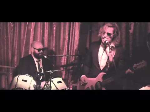 Down in Mexico by The Tarantinos