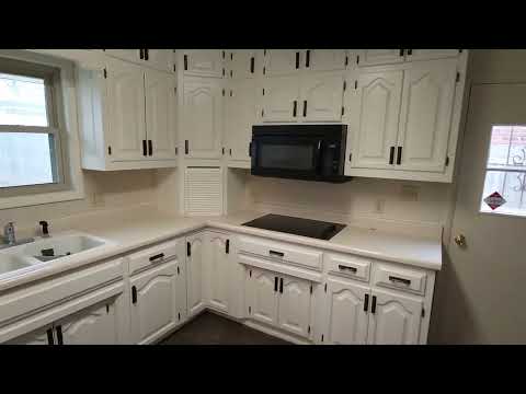 Old kitchen cabinet restoration using Stix primer and Scuff-X.