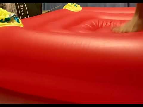 Yakko jumping barefoot on bouncy castle