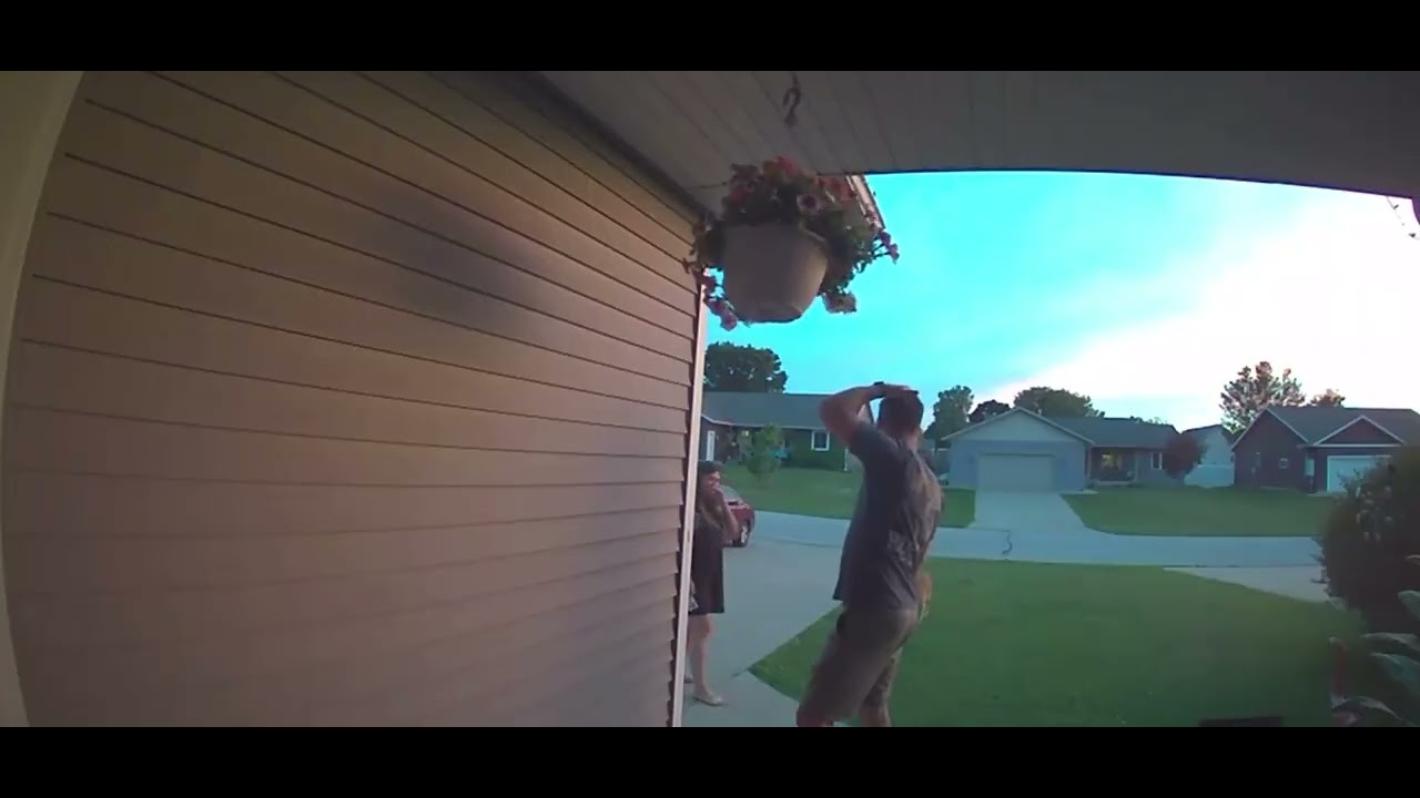 Tall Boyfriends Bumps Head on Hanging Flowers || ViralHog