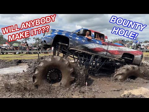 Mega Monster Trucks VS A BOTTOMLESS Mud Pit!!!  Full Ironhorse Bounty Hole Competition!!
