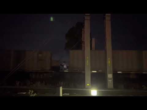 Pacific National’s 8110-8249 on a garbage train passing Campbelltown NSW 21-2-23