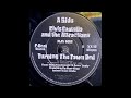 Elvis Costello And The Attractions - Turning The Town Red (1984)
