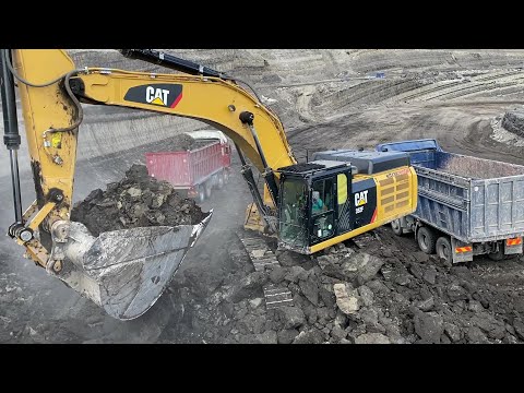 Caterpillar 352F Excavator Loading Mercedes And MAN Trucks
